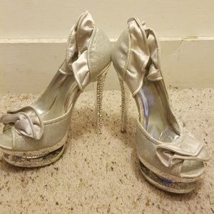 silver high keels with rhinestones and ruffles fin